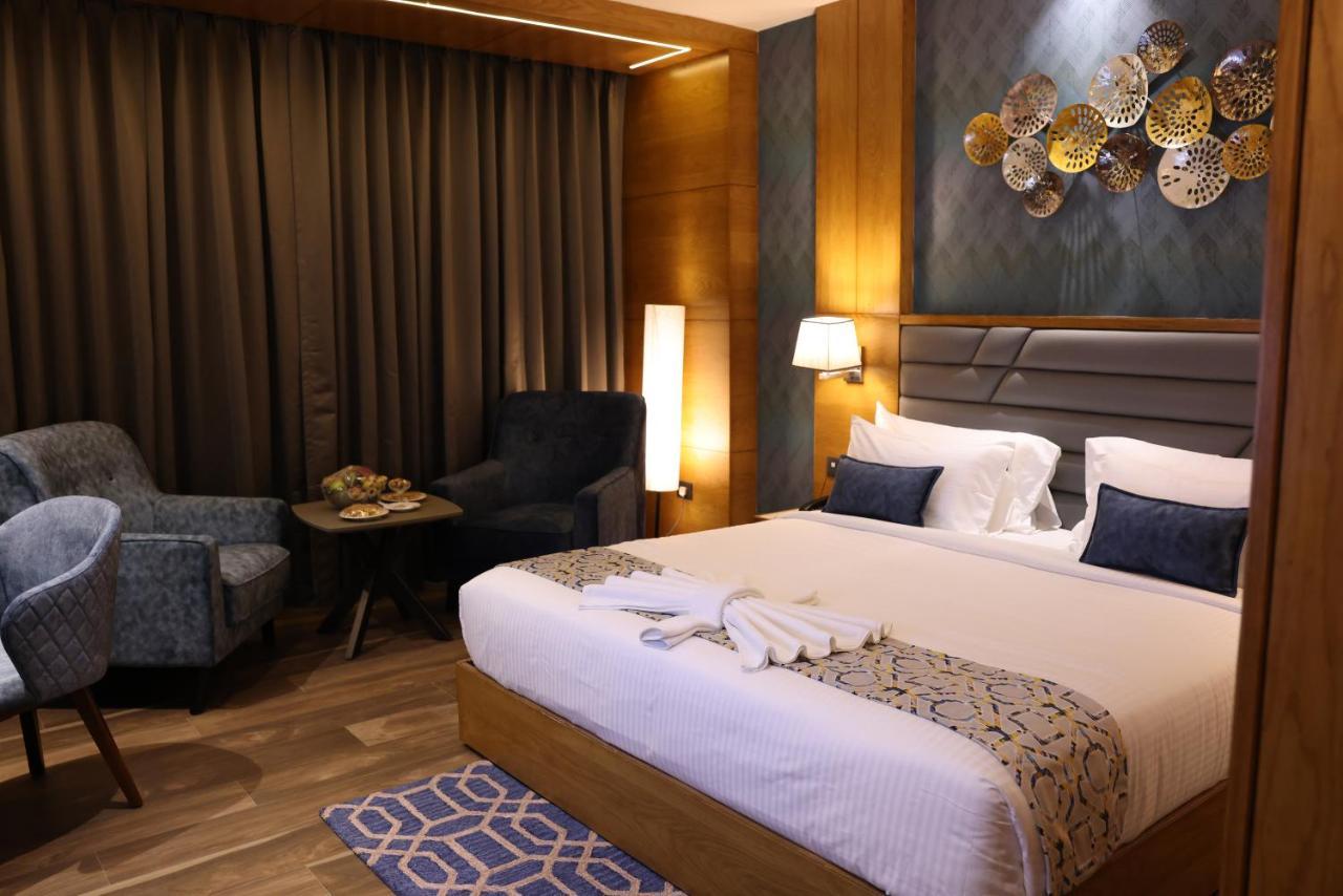 Aj Grand Hotel Mangalore Extérieur photo